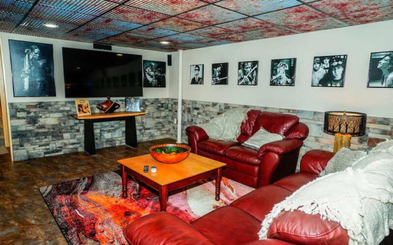 TV/Music Room Lined with Photos of Rock and Roll Legends